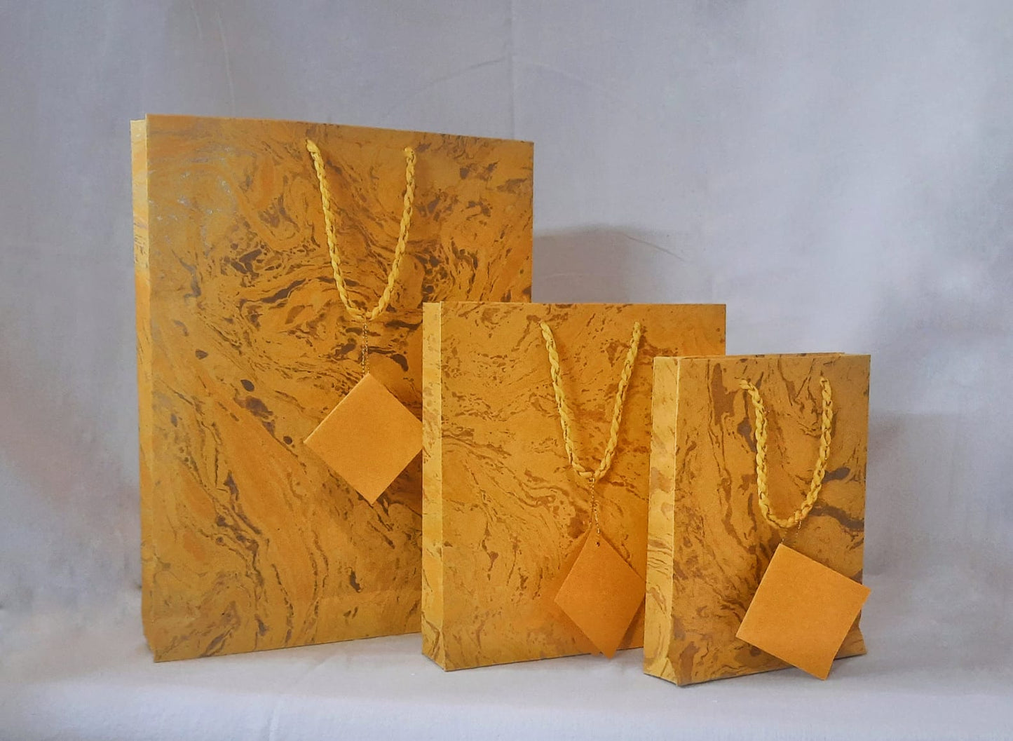 Hand designed Marbled Gift Bags in vibrant shades of Handmade Paper