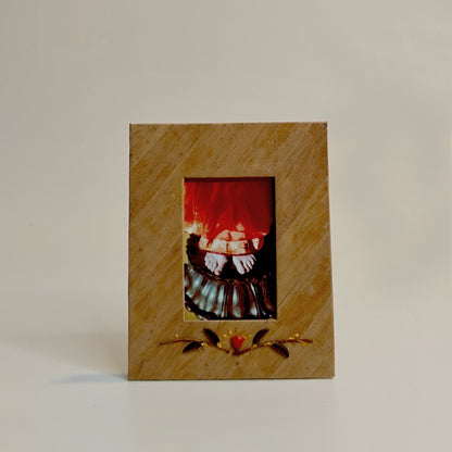 handcrafted banana leaf picture frame of the mother of sri aurobindo ashram