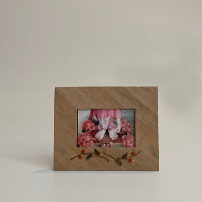 conscious table decor of the mother's feet photo frame by nava vihan