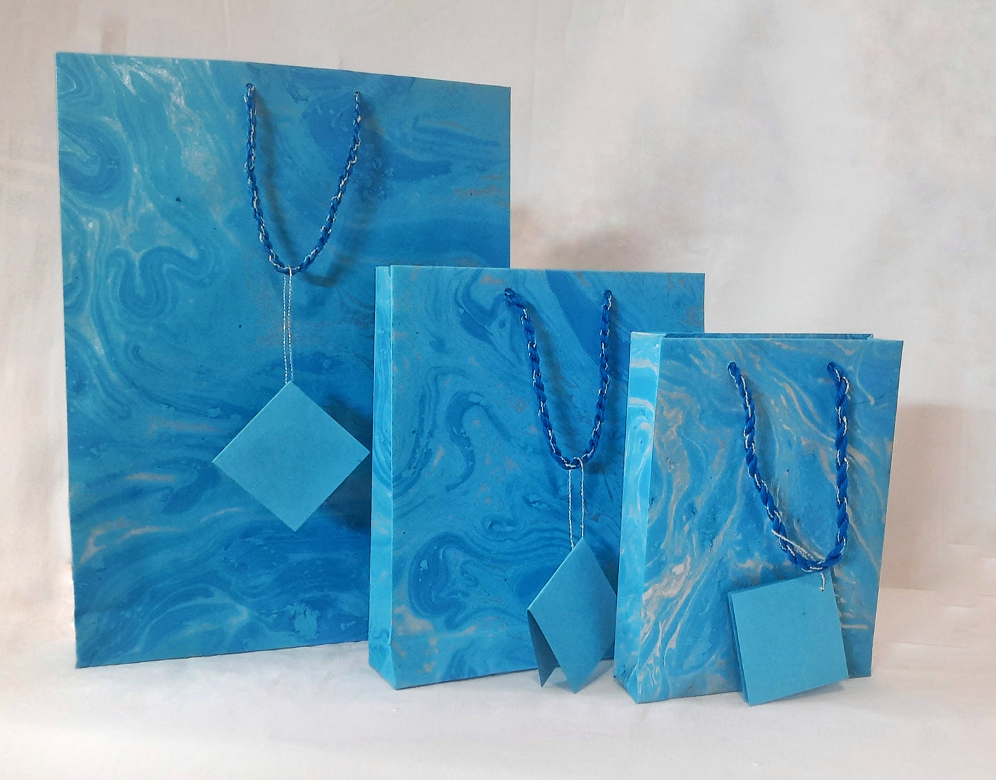 Hand designed Marbled Gift Bags in vibrant shades of Handmade Paper