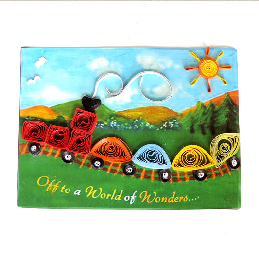 A rectangular Fridge Magnet handcrafted with quilled toy train with colourful compartments with mountains and valley in the background.