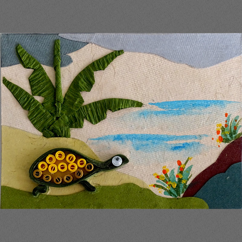 A rectangular Fridge Magnet handcrafted with quilled tortoise and paper cut-out plant and painted shrubs.