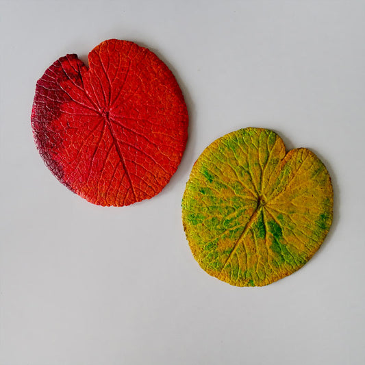 handcrafted wood free paper pulp coasters.